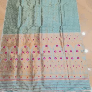 Pure Paat Sador mekhela in light blue color in Heavy guna work.